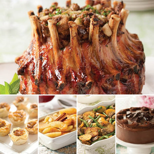 Crown Roast of Pork Complete Dinner, featuring Stuffed Pork Crown Roast (top), Caramelized Onion & Feta Pastry Blossoms, Kettle Cooked Apples, Vegetable Potato Medley, and Layer Cake Sampler (bottom left to right)