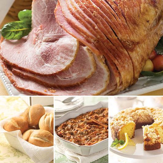 Artisan Ham Dinner featuring Artisan Spiral Sliced Ham (top), Gourmet Dinner Rolls, Sweet Potato Casserole, and Lemon Crunch Cake (bottom left to right)