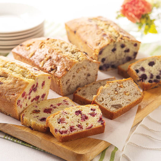 Loaf Cake Sampler, featuring Banana Nut, Lemon Blueberry, and Cranberry Orange.