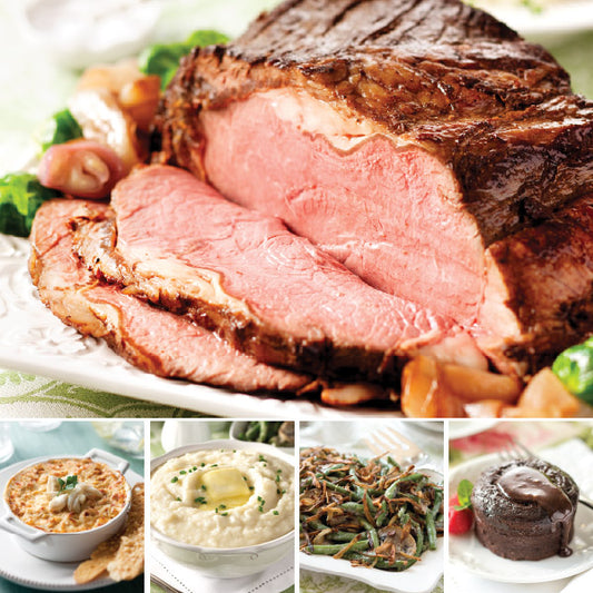 Prime Rib Roast Complete Dinner, featuring Prime Rib Roast (top), Creamy Crab Dip, Crème Fraîche Mashed Potatoes, Green Bean Casserole, and Molten Chocolate Cakes (left to right).