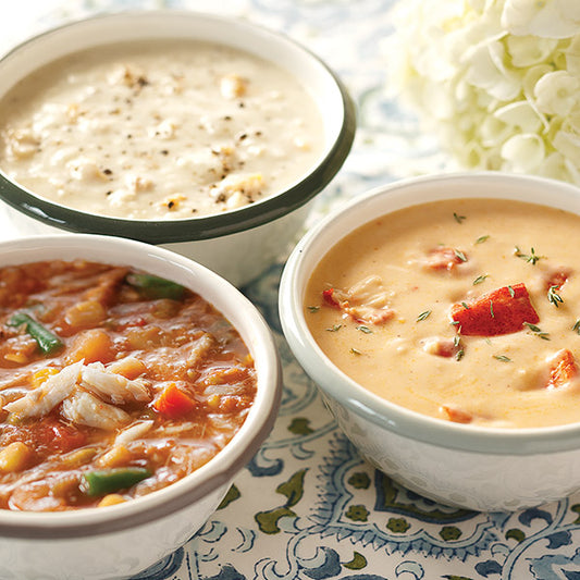Seafood Soup Sampler, featuring Maryland Crab Soup, Lobster Bisque, and New England Clam Chowder.
