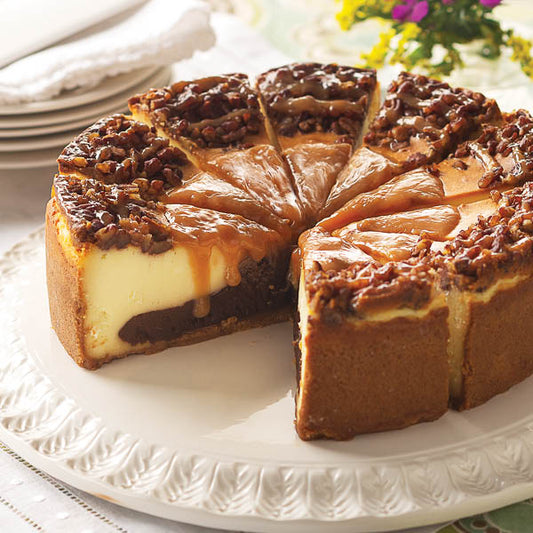 Turtle Cheesecake, 9" cake presliced to serve 12.